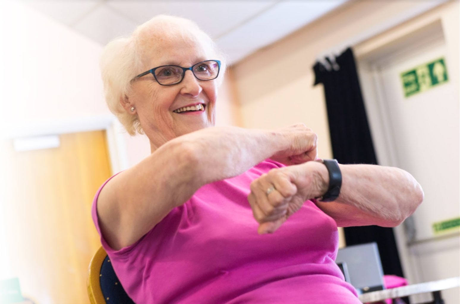 Woman doing seated exercise